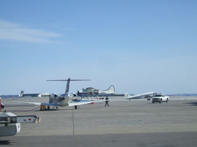 Cessna Citation CJ1 (C-GWGZ) - Parked at Woodward Aviation FBO,Beaver in the front and DC-3 Taxiing. May 7/9