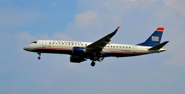 Embraer ERJ-190 (N953UW) - First spotting trip to PHL, only there for about 15 minutes, but caught this. Landing 27R, taken on Hogs Island Road.