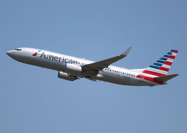 Boeing 737-800 (N946NN) - Departing DFW.