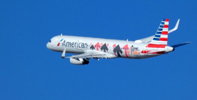 Airbus A321 (N162AA) - Shortly after departure is this 2016 American Airlines Airbus 321-231 "Stand up to Cancer" livery in the Winter of 2022.