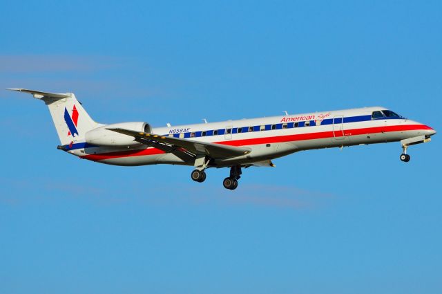 Embraer ERJ-145 (N858AE) - American Eagle - N858AE - ERJ-145 - Arriving KDFW 11/19/2013 - **NOTE** Look at the window close to the back for a good look at a passenger.