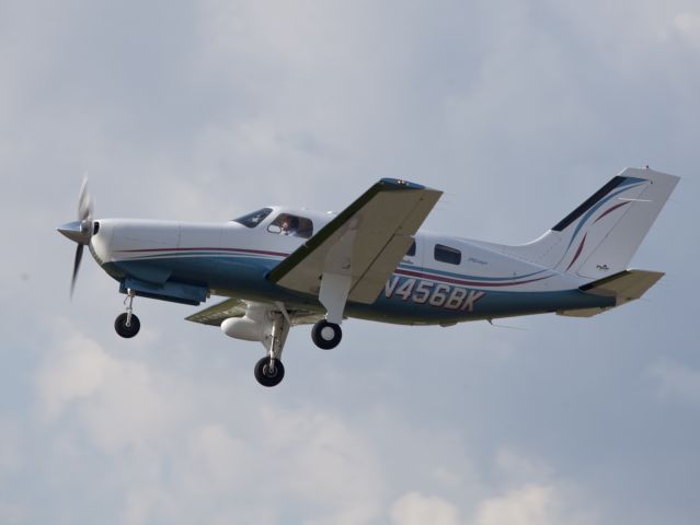 Piper Malibu Mirage (N456BK) - Take off runway 26. Note the weather radar in the pod under the right wing.