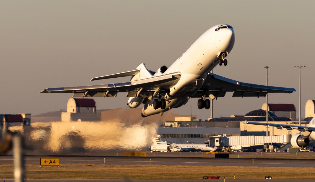 BOEING 727-200 (N216WE) - Another angle of the coal rolling 727 launching off of 17R at SDF during peak season. Really lucked out with this lighting!