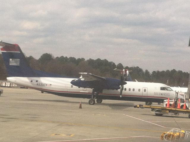 de Havilland Dash 8-300 (N330EN) - Just about to start pushback at KCLT.