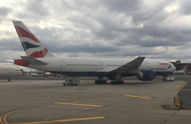 — — - Hold on runway at Newark