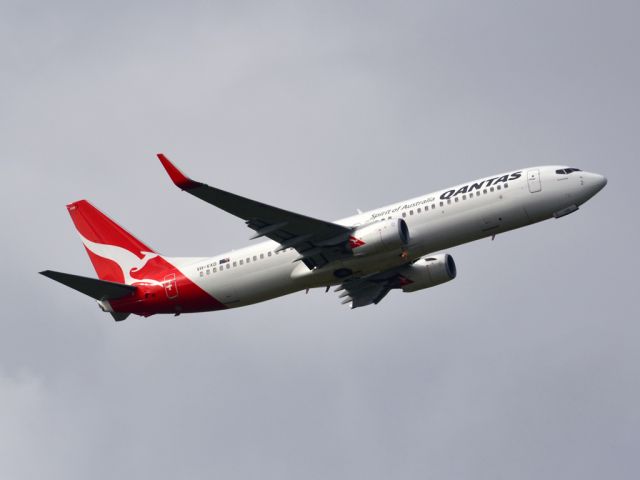 Boeing 737-800 (VH-VXD) - Getting airborne off runway 23 on a gloomy, cold winters day. Wednesday 4th July 2012.