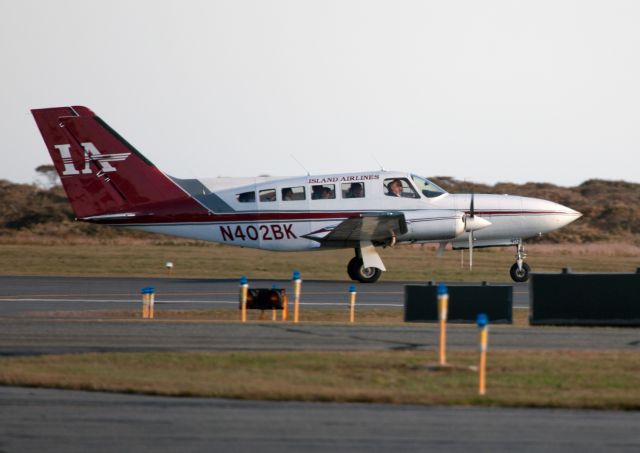 Cessna 402 (N402BK) - On a busy Columbus Day weekend at Nantucket.