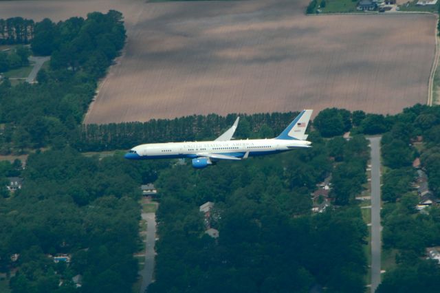 99-0003 — - Air Force Two taking off from KISO on a training flight. I believe this airplane is technically referred to as "Air Force Two" only when the vice-president is on board. It was not using that call sign at this time so I doubt the VP was actually on board at the time. The approach controller instructed him to maintain his heading and 2000 until I passed over him in my Cessna 150. After I was safely passed by, he was cleared to continue his climb, at which point he pitched up at least 15 degrees and was already several thousand feet above my altitude of 3500 within a minute.