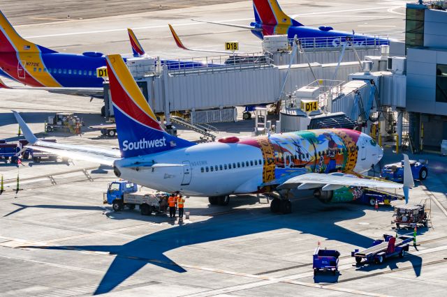 Boeing 737-700 (N945WN) - A Southwest 737-700 in Florida One special livery parked at PHX on 2/12/23 during the Super Bowl rush. Taken with a Canon R7 and Canon EF 100-400 II L lens.