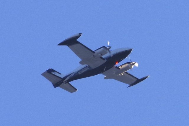 Cessna 340 (N200GC) - Doing loops over Fitchburg, MA.