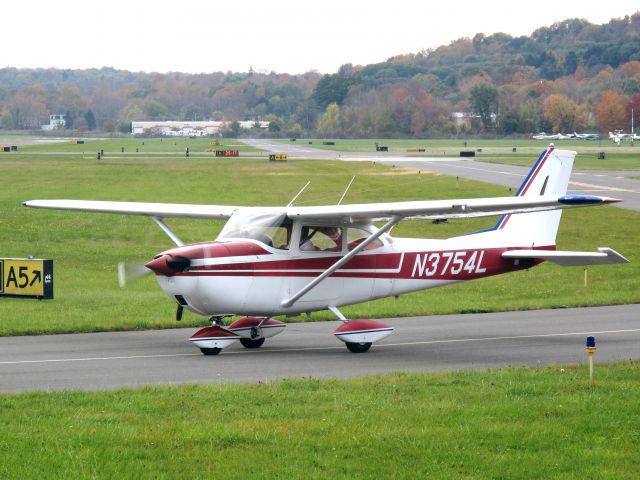 — — - Holding short runway 26.