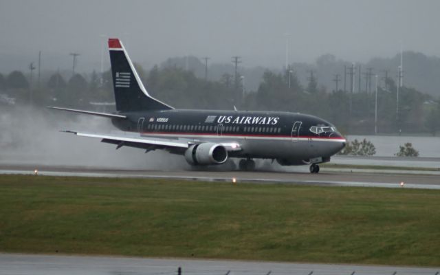 N589US — - Rain soaked runway at Nashville