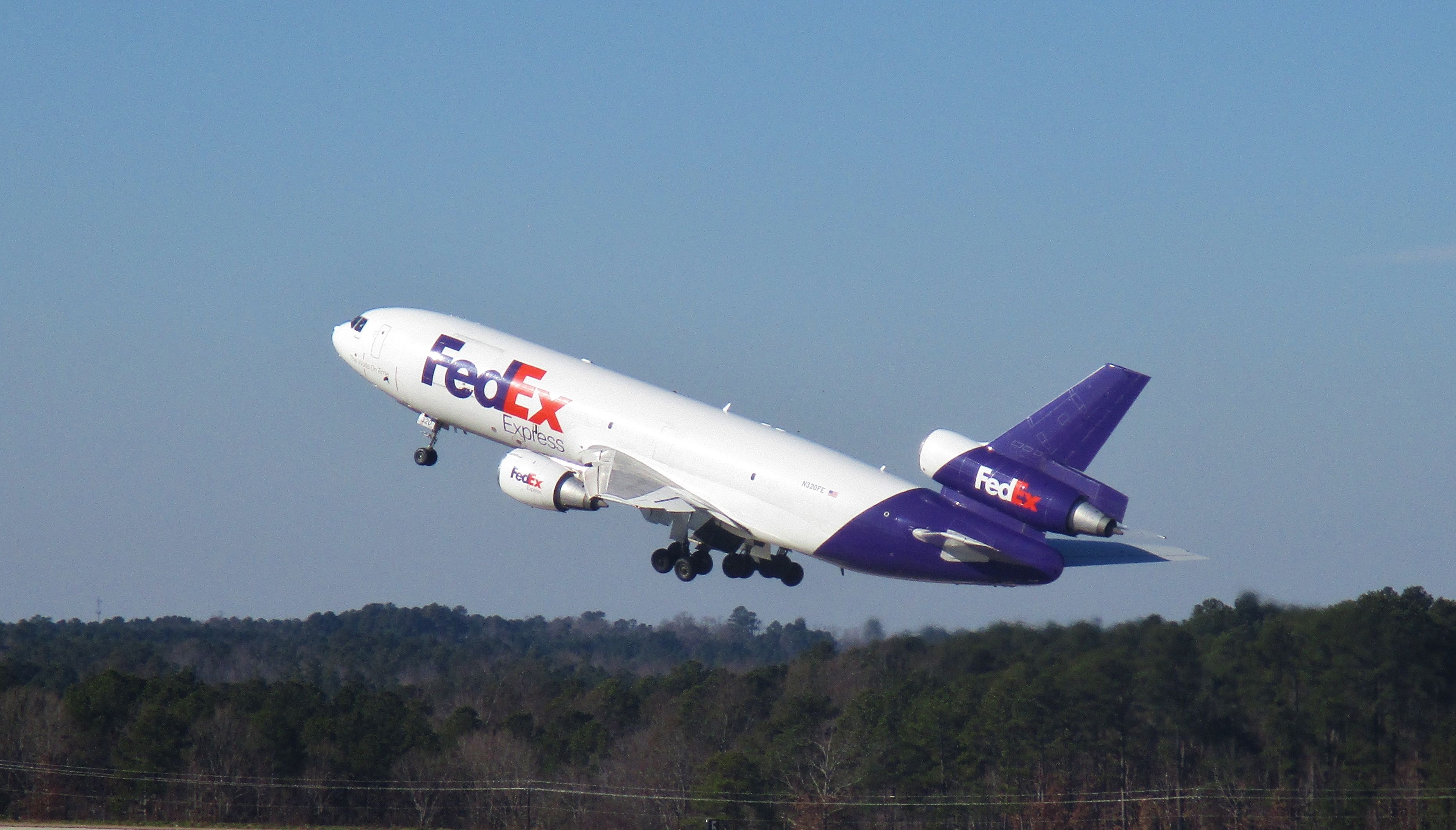 McDonnell Douglas DC-10 (N320FE) - The MD-10 makes her triumphant return to RDU for the Christmas season! Well, she was leaving - but shell be coming back.  Wonderful empty plane rotation.