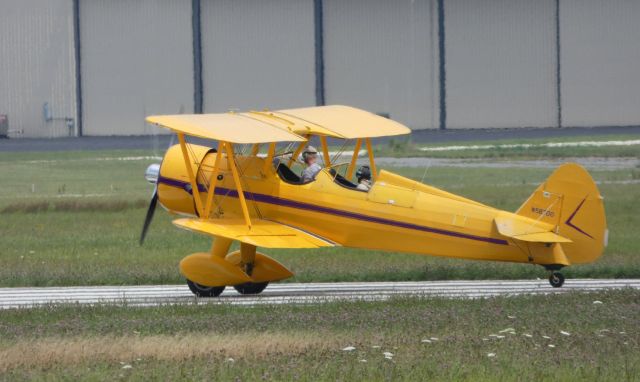 Boeing PT-17 Kaydet (N58700) - Departing down the active runway is this 1942 Stearman Boeing A75N (PT-17) otherwise known as the "Cannibal Queen" in the Summer of 2019.