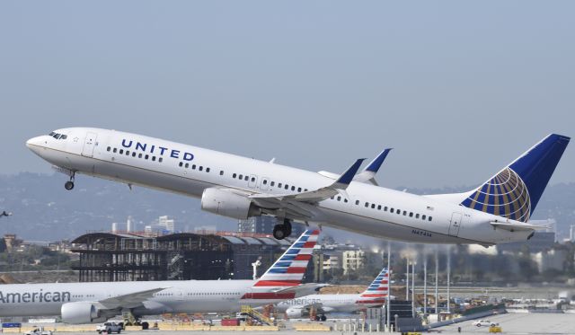 Boeing 737-900 (N47414) - Departing LAX on 25L