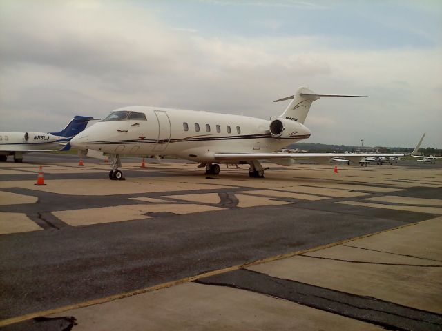 Bombardier Challenger 300 (N306MF) - Photo taken outside of Landmark Avation building, 26 APR 2012.