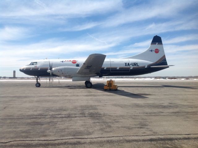 CONVAIR CV-580 (XA-URL) - Beautiful Convair 640 at Willow Run airport, preparing for the long trip heading Back to Mexico