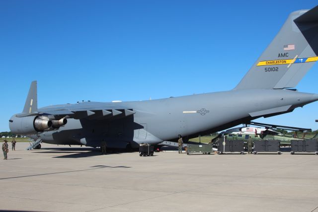 Boeing Globemaster III — - A C-17 Globemaster 3 with the 315th Airlift Wing Charleston, SC takes on Marine One which was based out of Appleton during the recent President Trump Oshkosh Visit. 