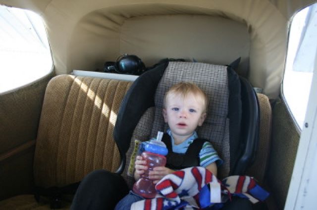 Cessna Skyhawk (N6974X) - My boys first little airplane ride.  He slept through it.