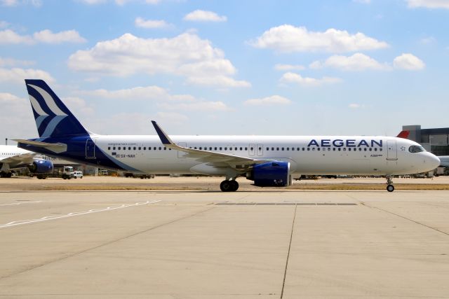 Airbus A321neo (SX-NAH) - Taxiing to Stand 216 on 8-Jul-22 operating flight AEE600 from LGAV.