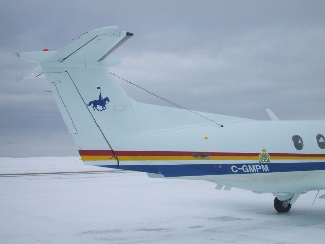 Pilatus PC-12 (C-GMPM) - Parked at RCMP Hangar Goose Airport NL, April 7/9