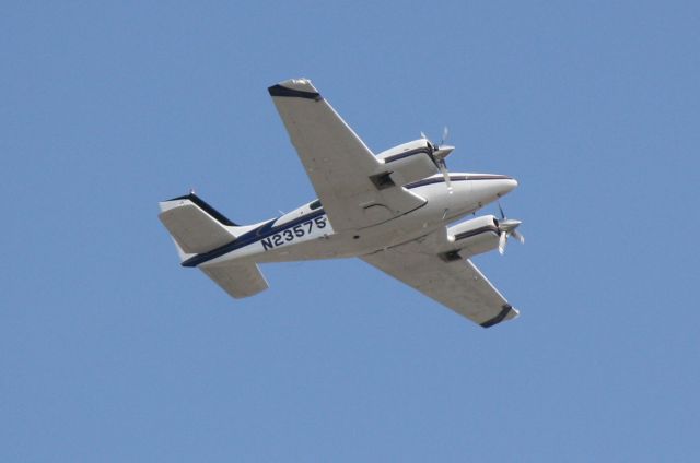 Beechcraft 55 Baron (N23575) - N23575 departs Runway 14 at Sarasota-Bradenton International Airport