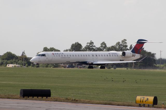 Canadair Regional Jet CRJ-900 (N309PQ) - Leaving SLN after storage during COVID-19. 