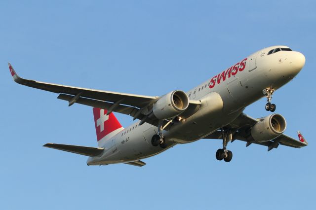 HB-JLT — - SWISS A320-200, sporting the new "Sharklets" approaches runway 027L at LHR.