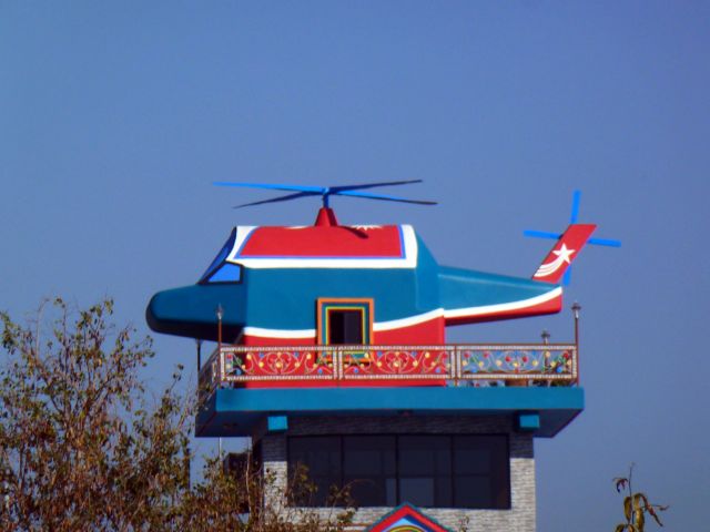 Eurocopter Super Puma (EC-225) (AHOUSE) - Saw it in a top of a house. It is made of concrete. In Pokhara, Nepal