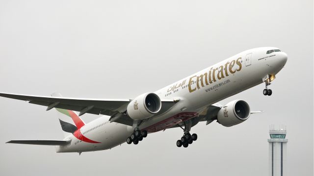 BOEING 777-300 (A6-EGK) - UAE777 departs runway 16R to begin its delivery flight to Dubai (OMDB/DXB) 12/15/11. (cn 41071 / ln 981).