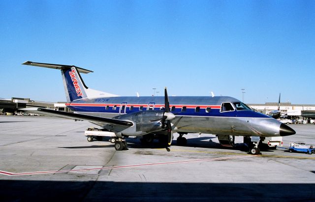 Embraer EMB-120 Brasilia (N187SW) - KSLC - July 1989 view at Salt Lake - this EMB-120 ready for a flight to ????