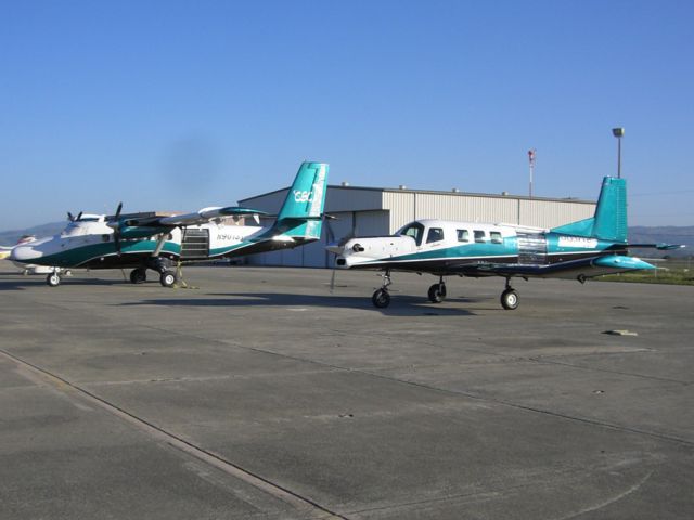 PACIFIC AEROSPACE 750XL (N902ST) - Twin Otter N901ST and PAC 750XL N902ST sit on the ramp in Hollister, CA.