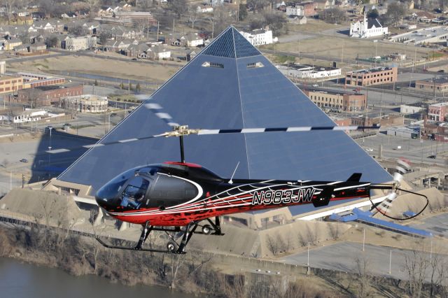 N9835JW — - Test flight by the owner on his new purchase.  This Enstrom 280 FX is photographed flying past the Memphis Pyramid, along the Mississippi River.