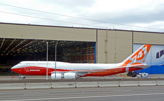 N6067E — - ROLL OUT SERIES #5:  Boeing 747-8 Intercontinental RC001 Business Jet for undisclosed government  customer about to be pushed out of Boeing Assembly Plant hangar on 2-13-2011 roll-out day at Paine Field, Everett, Washington  ||||   Photo by Bruce McKinnon