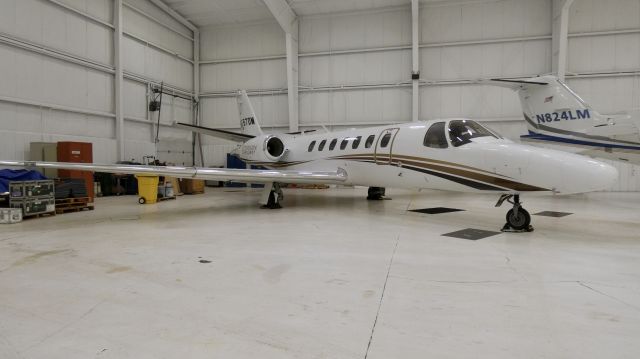 Cessna Citation V (N657DM) - A Cessna Citation Encore sitting in Hangar 4 at KBUF!