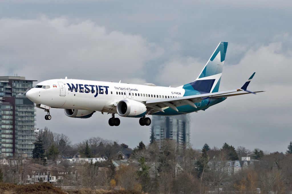 Photo of WJA Boeing 737 MAX (C-FHCM) - FlightAware