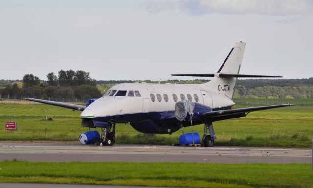 British Aerospace Jetstream 31 (G-JXTA) - British Aerospace BAe Jetstream 31 G-JXTA stored at Inverness Airport