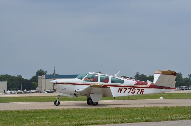 Beechcraft 35 Bonanza (N7797R) - Bonanza mass arrival at AirVenture 2014