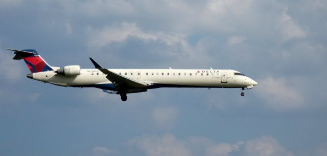 Canadair Regional Jet CRJ-900 (N298PQ) - On short final is this 2013 Delta Airlines Connection Canadair Regional Jet 900LR in the Summer of 2023.