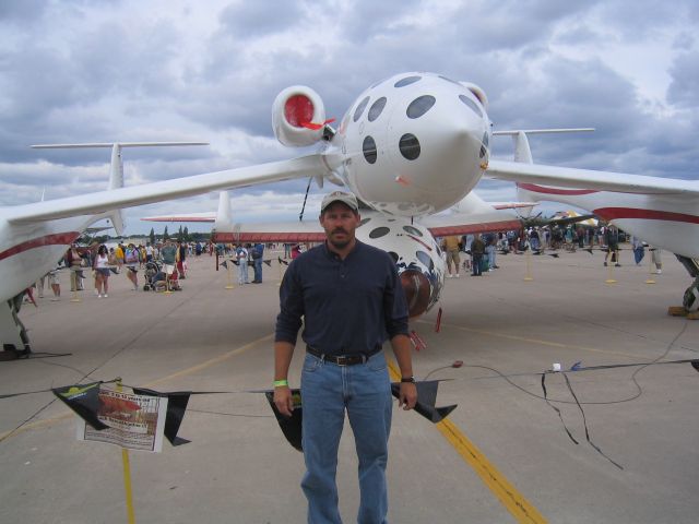 — — - Me in front of White Knight and Space Shipe One at Oshkosh