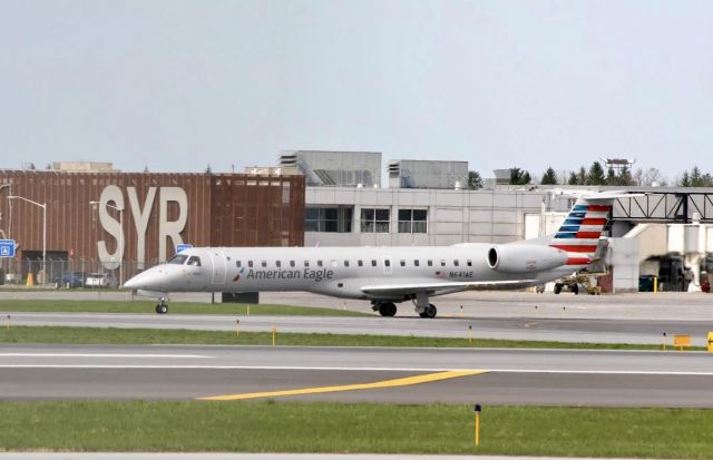 Embraer ERJ-145 (N641AE) - Taxing past the SYR sign