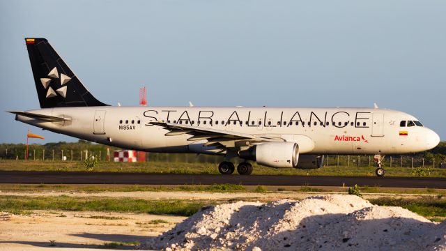 Airbus A320 (N195AV) - Golden hour shot.