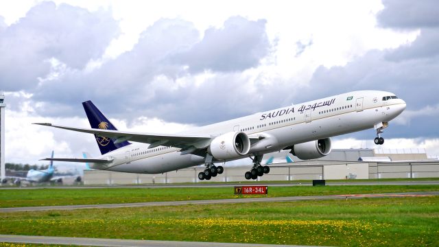 BOEING 777-300 (HZ-AK26) - SVA9026 on rotation from Rwy 16R for its delivery flight to OERK / RUH on 3/31/15. (ln 1288 / cn 42264).