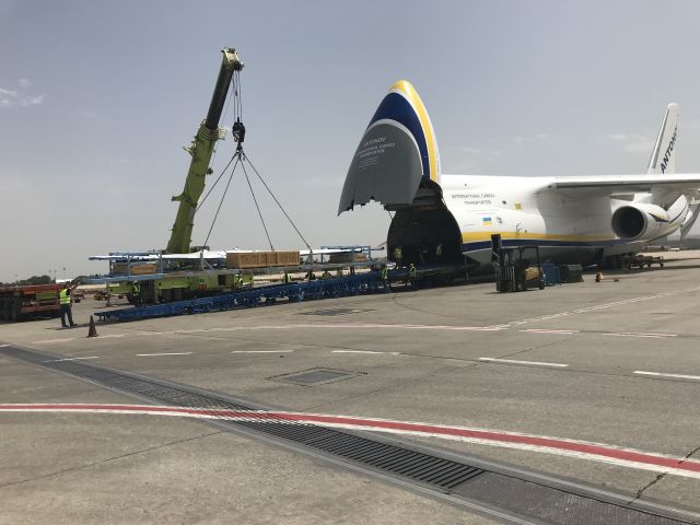 Antonov An-12 (UR-82009) - Quite an operation to build the unloading platform.