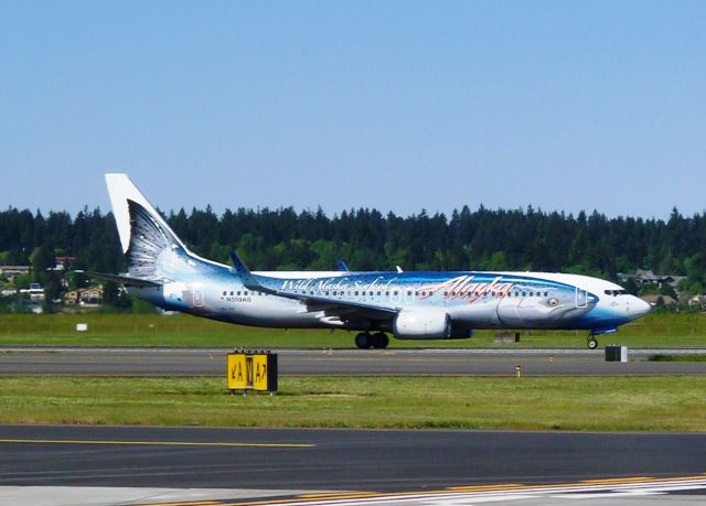 Boeing 737-800 (N559AS) - Taking off on 10L.