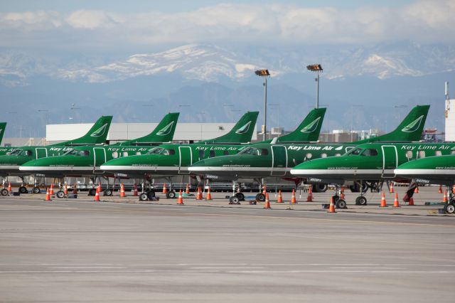 Fairchild Dornier SA-227DC Metro (N787KL) - 15 Metroliners lined up at DIA cargo on Thanksgiving day 2012.