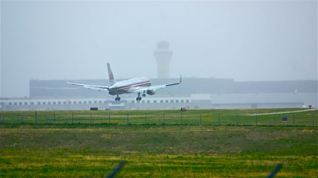 BOEING 767-200 (N646AA) - American Airlines 757 landing at DFW during some bad fog.