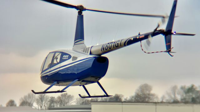 Robinson R-66 (N801GT) - An R66 departing from KHUF on a gloomy day. br /br /This aircraft is a 2018 Robinson R66 Turbine, SN 0891, owned/operated by Midwest Jet Charter Inc. 10/31/22. 