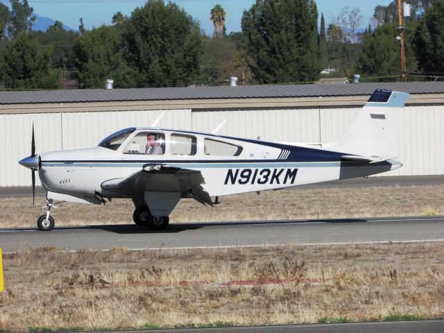 Beechcraft Bonanza (33) (N913KM) - Taxiing to parking