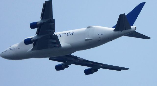 Boeing Dreamlifter (GTI4151) - DREAMLIFTER with flaps and slats partial, rolling out from left base descending thru 2,500 onto RNAV (GPS) RWY 34L [necessitated by 3-sm visibility in smoke, haze blowing in from British Columbia wildfires] 08-13-18 1248PDT; taken from 7.4nm S of threshold @ 543 MSL